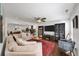 Inviting living room featuring a comfortable sectional sofa and a large flat-screen TV at 1011 Dogwood Forest Ne Dr, Marietta, GA 30068