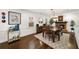Comfortable living room featuring hardwood floors, fireplace, and stylish décor at 1011 Dogwood Forest Ne Dr, Marietta, GA 30068