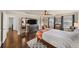 Relaxing main bedroom featuring hardwood floors, a dresser, and ample space at 1011 Dogwood Forest Ne Dr, Marietta, GA 30068