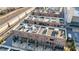 Townhomes with rooftop terraces, seating areas, and garden spaces shown from above at 269 Castleberry Station Dr, Atlanta, GA 30313