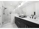 Modern bathroom with double vanity, spacious shower, and sleek finishes is the epitome of style and comfort at 269 Castleberry Station Dr, Atlanta, GA 30313
