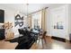 Dining room with modern lighting fixtures and sleek black dining set with seating for six at 269 Castleberry Station Dr, Atlanta, GA 30313
