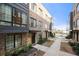 Brick townhomes featuring modern design elements and individual entrances at 269 Castleberry Station Dr, Atlanta, GA 30313