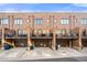 Beautiful brick townhomes feature private balconies and attached garages, combining style and convenience at 269 Castleberry Station Dr, Atlanta, GA 30313