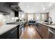 Stylish kitchen with modern appliances and a view into the elegant dining area at 269 Castleberry Station Dr, Atlanta, GA 30313