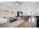 Bright, open living space with hardwood floors flowing into modern kitchen and stainless steel appliances at 269 Castleberry Station Dr, Atlanta, GA 30313