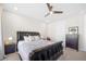 Spacious main bedroom featuring a ceiling fan and soft lighting, creating a relaxing atmosphere at 269 Castleberry Station Dr, Atlanta, GA 30313