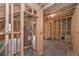 Unfinished basement with exposed wood framing, insulation, and concrete floor at 2960 Fareed St, Douglasville, GA 30135