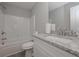 Neutral bathroom featuring a white vanity with granite countertop and shower-tub combo at 2960 Fareed St, Douglasville, GA 30135