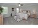 Neutral bedroom with carpet, large windows with blinds and a queen bed at 2960 Fareed St, Douglasville, GA 30135