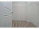 Walk-in closet with carpet and wire shelving at 2960 Fareed St, Douglasville, GA 30135