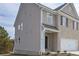 Side view of a two-story home with stone and siding exterior at 2960 Fareed St, Douglasville, GA 30135