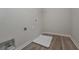 Laundry room featuring hard surface floors and utility hookups at 2960 Fareed St, Douglasville, GA 30135