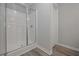 New shower features glass doors, white subway tile, and chrome fixtures at 2960 Fareed St, Douglasville, GA 30135