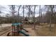 Community playground with slides and swings, offering a great space for children to play at 330 Teal Ct, Roswell, GA 30076