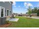 Charming backyard patio with striped outdoor rug, perfect for relaxing or entertaining outside at 508 Red Terrace, Marietta, GA 30060