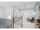 Upstairs hallway with modern railing, recessed lights and space for seating at 508 Red Terrace, Marietta, GA 30060