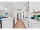 Modern kitchen with stainless steel appliances, white cabinetry, and a spacious island at 508 Red Terrace, Marietta, GA 30060