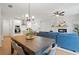 Open concept living space featuring a modern kitchen, dining area, and comfortable seating at 508 Red Terrace, Marietta, GA 30060
