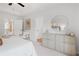 Bright main bedroom with large mirror, a ceiling fan, and neutral tones at 508 Red Terrace, Marietta, GA 30060