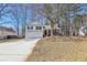 Charming two-story home with a two-car garage and a welcoming porch at 155 Hitchcock Dr, Villa Rica, GA 30180