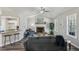 Bright living room with a fireplace and open kitchen access at 155 Hitchcock Dr, Villa Rica, GA 30180