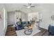 Stylish open floor plan with a living room, dining area, and kitchen at 155 Hitchcock Dr, Villa Rica, GA 30180