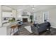 Bright and open living space with modern flooring and a cozy fireplace at 155 Hitchcock Dr, Villa Rica, GA 30180
