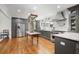 Bright eat-in kitchen boasts gray cabinets, stainless steel appliances, and a large island at 167 Atwood Nw Dr, Marietta, GA 30064