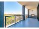 Spacious balcony with glass railings and outdoor grill offering expansive views at 2425 Peachtree Ne Rd # 1104, Atlanta, GA 30305
