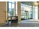 Inviting building entrance featuring valet service, modern lighting, and floor to ceiling windows at 2425 Peachtree Ne Rd # 1104, Atlanta, GA 30305
