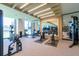 Modern gym featuring cardio equipment, weights, and mirrored walls at 2425 Peachtree Ne Rd # 1104, Atlanta, GA 30305