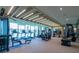 Well-equipped fitness center with treadmills, weights, and large windows at 2425 Peachtree Ne Rd # 1104, Atlanta, GA 30305