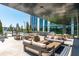 Inviting outdoor lounge area with comfortable seating, BBQ, and modern architectural design at 2425 Peachtree Ne Rd # 1104, Atlanta, GA 30305