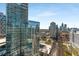 A beautiful aerial view showing the building's unique location in relation to the surrounding cityscape at 1080 Peachtree Ne St # 1909, Atlanta, GA 30309