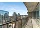 Spacious private balcony with city views, perfect for outdoor relaxation and entertaining at 1080 Peachtree Ne St # 1909, Atlanta, GA 30309