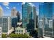 Striking glass high-rise with a pool, lush green rooftop garden, and scenic city views at 1080 Peachtree Ne St # 1909, Atlanta, GA 30309