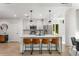 Modern kitchen with a quartz countertop island, stainless steel appliances, and ample natural light at 1080 Peachtree Ne St # 1909, Atlanta, GA 30309