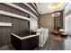 A luxury lobby with high ceilings, modern lighting, and a marble reception desk offers a stunning entrance at 1080 Peachtree Ne St # 1909, Atlanta, GA 30309