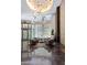 A modern lobby with high ceilings, modern lighting, and comfortable seating creates an inviting atmosphere at 1080 Peachtree Ne St # 1909, Atlanta, GA 30309
