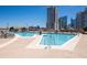 Inviting swimming pool area with lounge chairs and umbrellas, perfect for relaxation at 1080 Peachtree Ne St # 1909, Atlanta, GA 30309