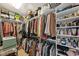 Spacious walk-in closet with ample shelving and hanging space for organized storage at 1222 Poston Se Pl, Smyrna, GA 30080