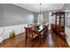 Sophisticated dining room boasts hardwood floors and decorative wall trim at 1222 Poston Se Pl, Smyrna, GA 30080