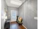 Inviting entryway featuring hardwood floors, stylish decor, and ample lighting at 1222 Poston Se Pl, Smyrna, GA 30080