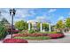 Smyrna Market Village entrance with flowers and shops, located in a thriving, walkable community at 1222 Poston Se Pl, Smyrna, GA 30080