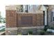 Community entrance featuring stone pillars and brick sign reading Village Walk at 1222 Poston Se Pl, Smyrna, GA 30080