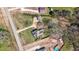 Aerial view of home showing roof, driveway and layout of the property and its position on the street at 1694 Mount Bethel Rd, Mcdonough, GA 30252