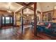 Open concept featuring living and kitchen area with seamless flow and hardwood floors at 1694 Mount Bethel Rd, Mcdonough, GA 30252