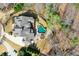 Aerial view showcasing home, backyard pool, spa, patio, and manicured lawn at 268 Hanson Way, Marietta, GA 30064