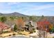 Aerial view of a beautiful home and manicured landscaping in a wooded area at 268 Hanson Way, Marietta, GA 30064